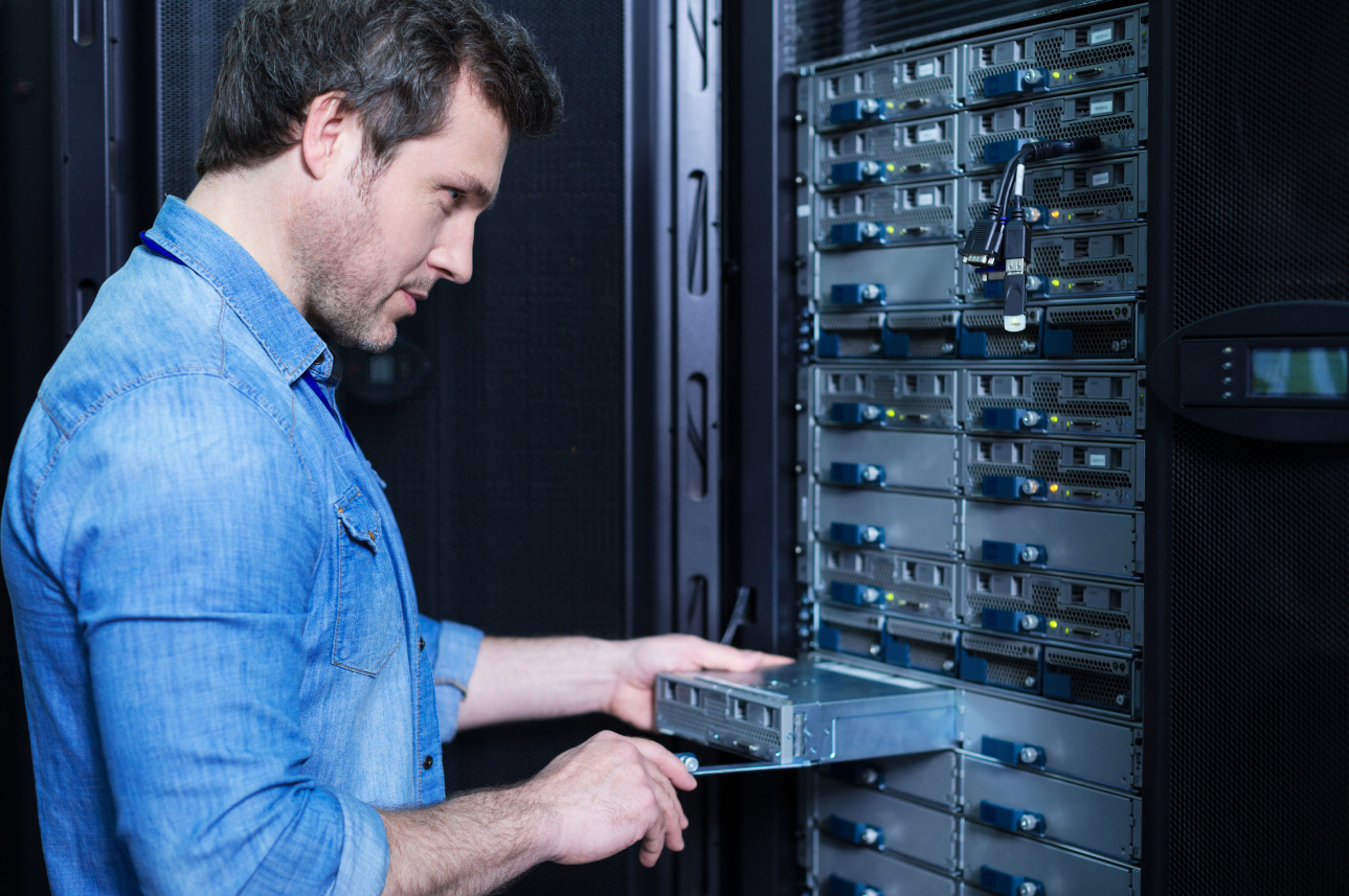 IT technician installing server